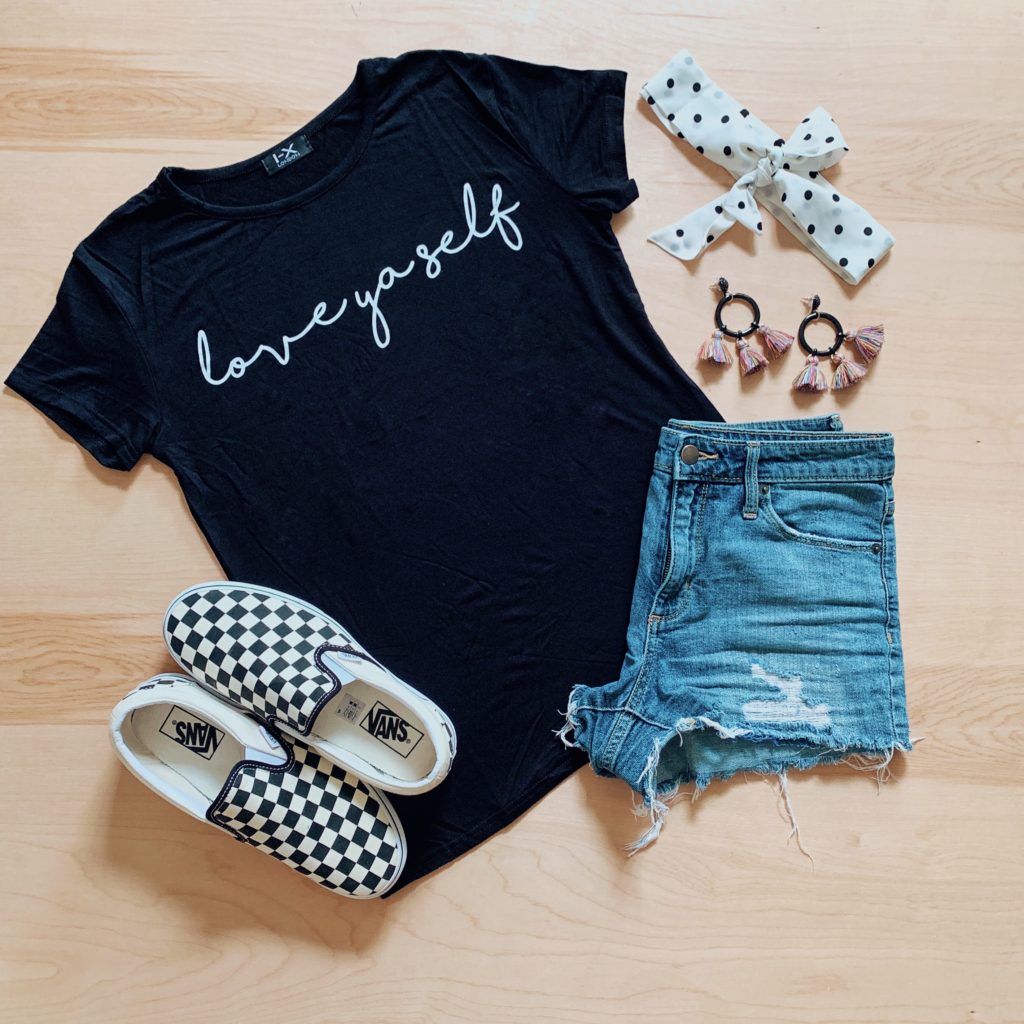 black tee shirt with white writing that says "love yaself" from femme luxe finery